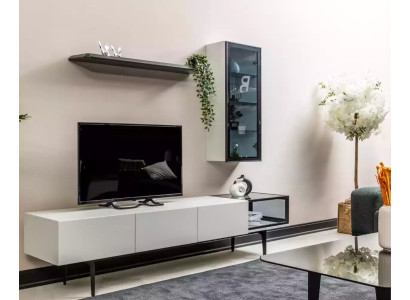 An incomparable TV wardrobe and shelves in a minimalist style