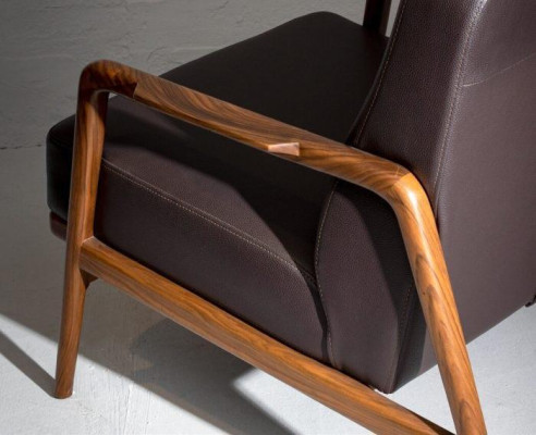 Design accent: Armchair in trendy color with simple wooden frame new