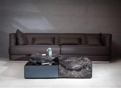 Stylish coffee table made of glass in a minimalist style for the living room
