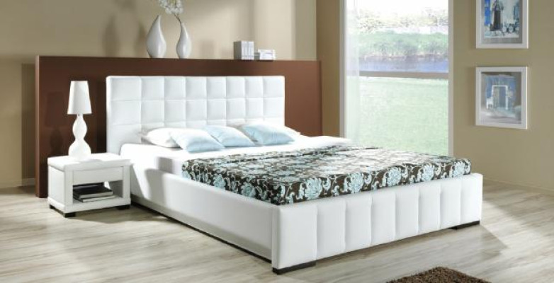 A luxurious designer bed in a sophisticated contemporary style of the highest quality