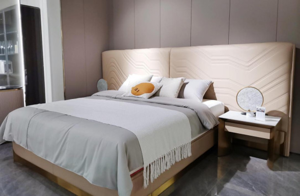 Elegant double bed. Luxurious bedroom bed. Stylish bed