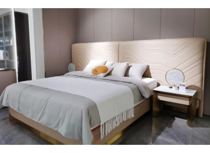 Elegant double bed. Luxurious bedroom bed. Stylish bed