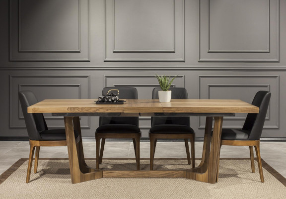 Elegant wooden table with chic black chairs in a modern design