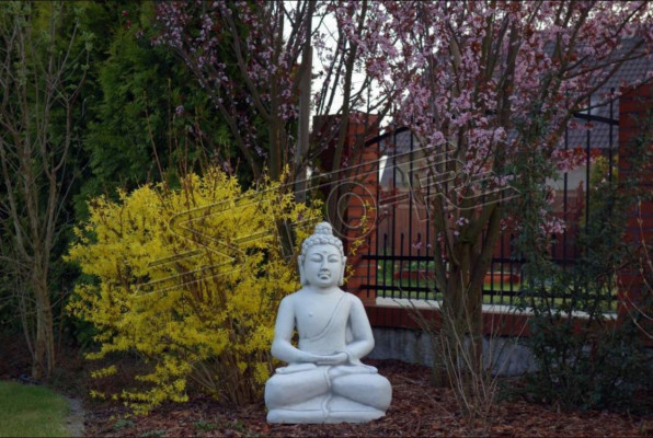 Buddha sculpture in stone effect. Decorative large sculpture for garden figure