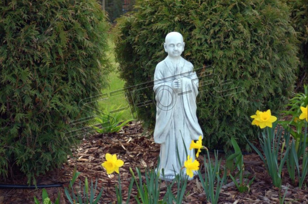 Buddha sculpture in stone effect. Large decorative sculpture for garden figure