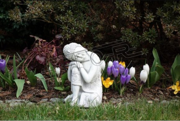 Decorative Buddha sculpture in stone effect. Large figure sculpture for garden