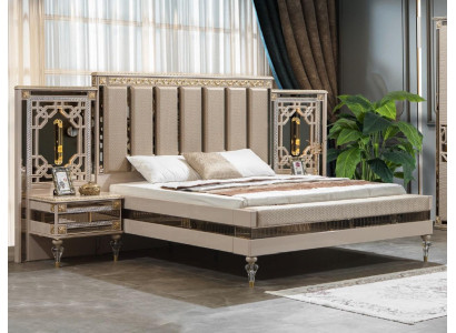 Elegant double bed with bedside tables in luxury design