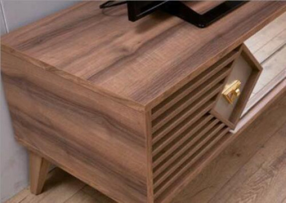 Incredibly stylish wooden table with mirror inserts for the TV