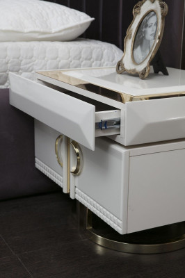 Beautiful 4-piece bedroom set in a modern style and milky white finish