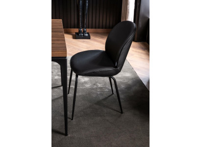 Laconic black chair in a modern design for the dining room