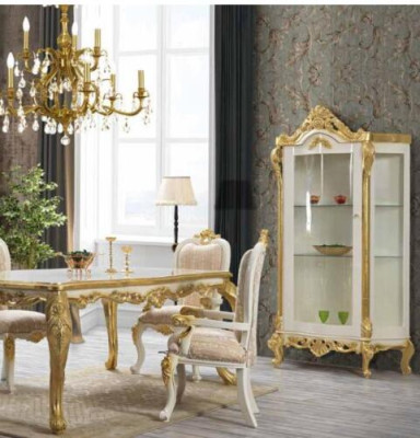 Luxurious dining room chair in beige-white tones with gold inserts, classically designed