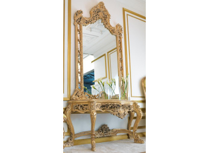 Luxurious carved console table and mirror in an elegant frame