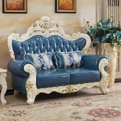 Classic s Chesterfield two-seater leather sofa with hand-carved details