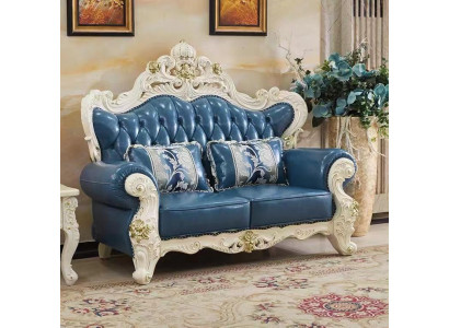 Classic s Chesterfield two-seater leather sofa with hand-carved details