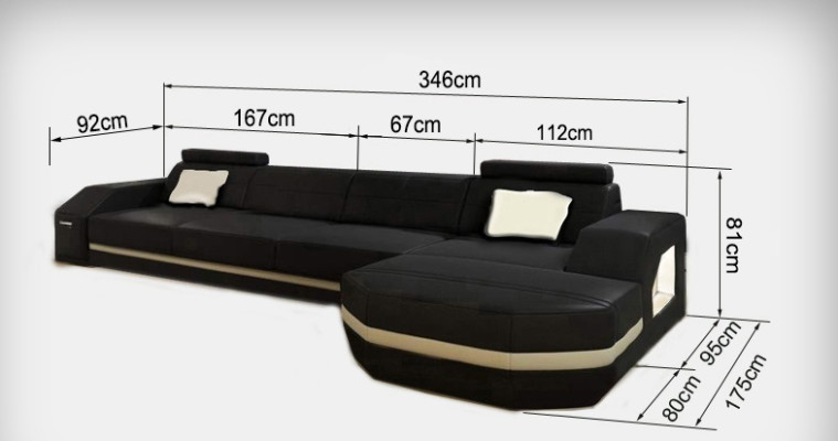 Elegant black corner sofa in L-shape. Stylish furniture for your home