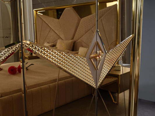 Glamorous bedroom experience luxury furniture set with detailed gold nuances