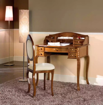 Classic r Desk with brown wooden chair in a study room