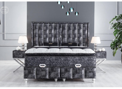 Black bed with mattress and two bedside tables in the bedroom furniture set