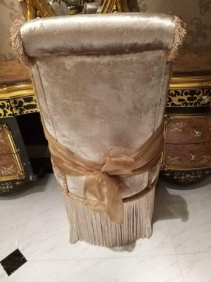 Pretty armchair in classic style in beige with decorative elements