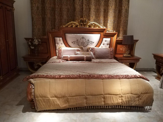 Classic double bed set with ornate nightstands