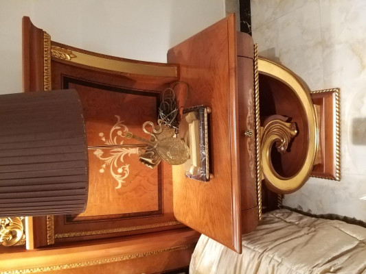 Classic double bed set with ornate nightstands