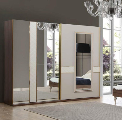 Luxury wardrobe with gold-plated accents and mirrors