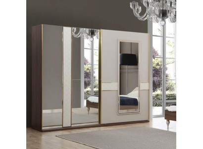 Luxury wardrobe with gold-plated accents and mirrors