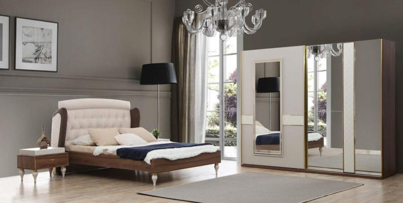 Luxury wardrobe with gold-plated accents and mirrors