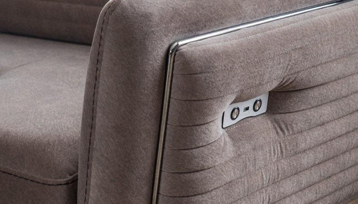 Luxurious, fashionable two-seater sofa with textile upholstery on high legs