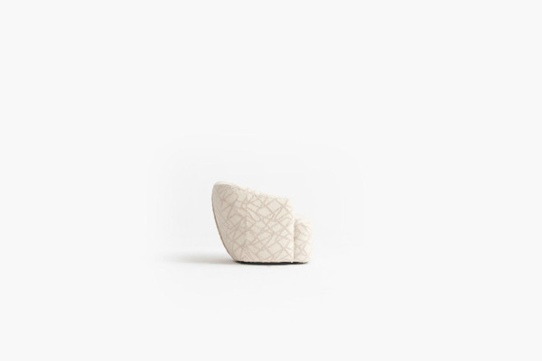 Upholstered cocktail chair in a pleasant color in a modern design