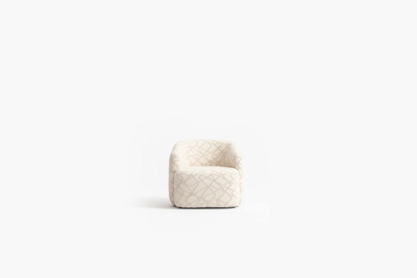 Upholstered cocktail chair in a pleasant color in a modern design