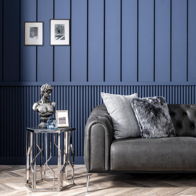 Black Chesterfield style four-seater straight sofa for the living room