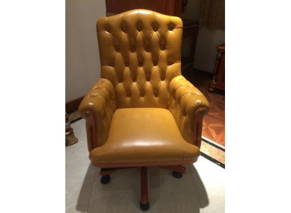 Stylish and modern executive chair in a luxurious baroque style is characterized by comfort and elegance Stylish and modern executive chair in a luxurious baroque style is characterized by comfort and elegance