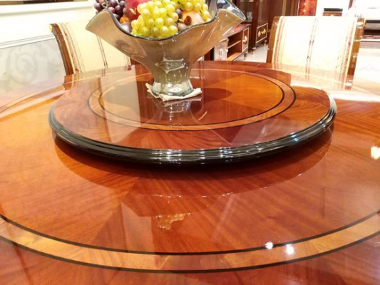 Beautiful round dining table made of natural wood with 4 chairs